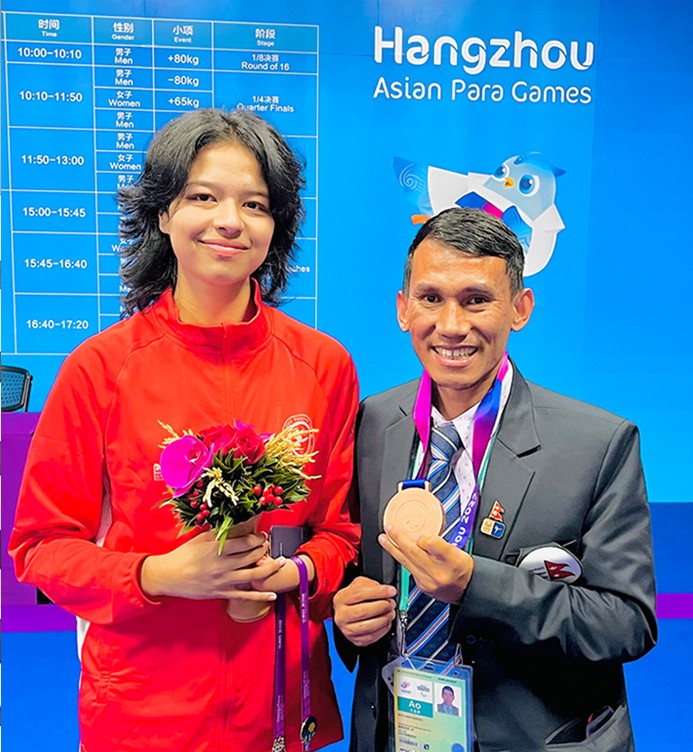 As the team coach at the 2022 Asian Para Games, I coached my athlete Palesha Goverdhan to win a bronze medal, making her the first Nepali para-athlete to earn a medal at the Asian Para Games.